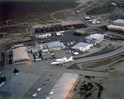 This is an overview, looking north-northwest, of Dryden Flight Research Center (2001) A wonderful shot of the orbiter Endeavor atop the 747 shuttle transport jet - with the NASA SR-71 on tarmac. Click to see big picture (1114x890 pixels; 727 KB)